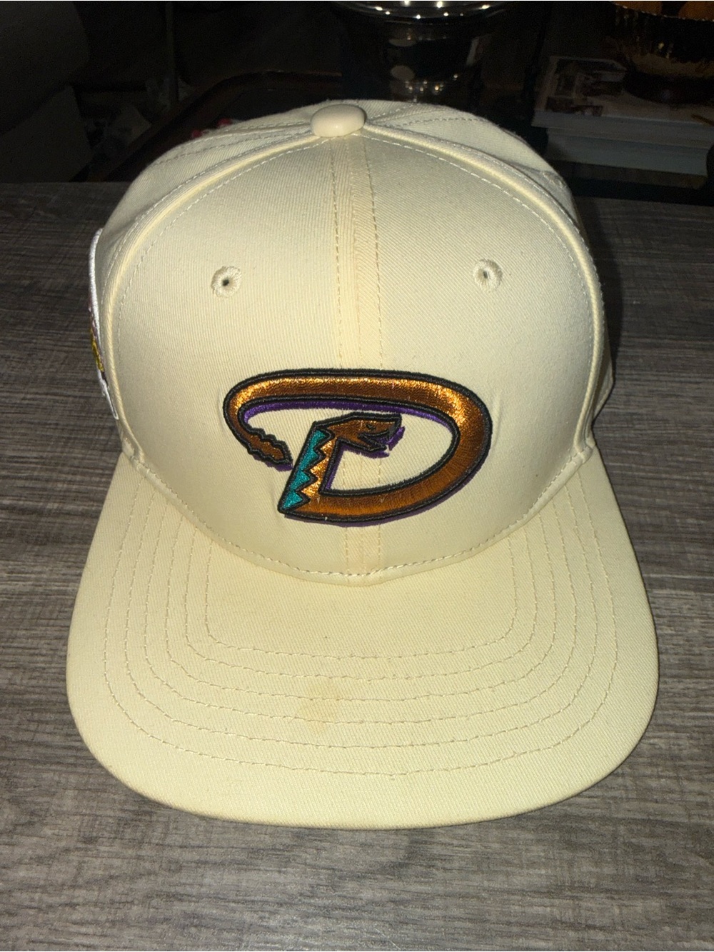 Cream Embroidered D-Logo Snapback Hat